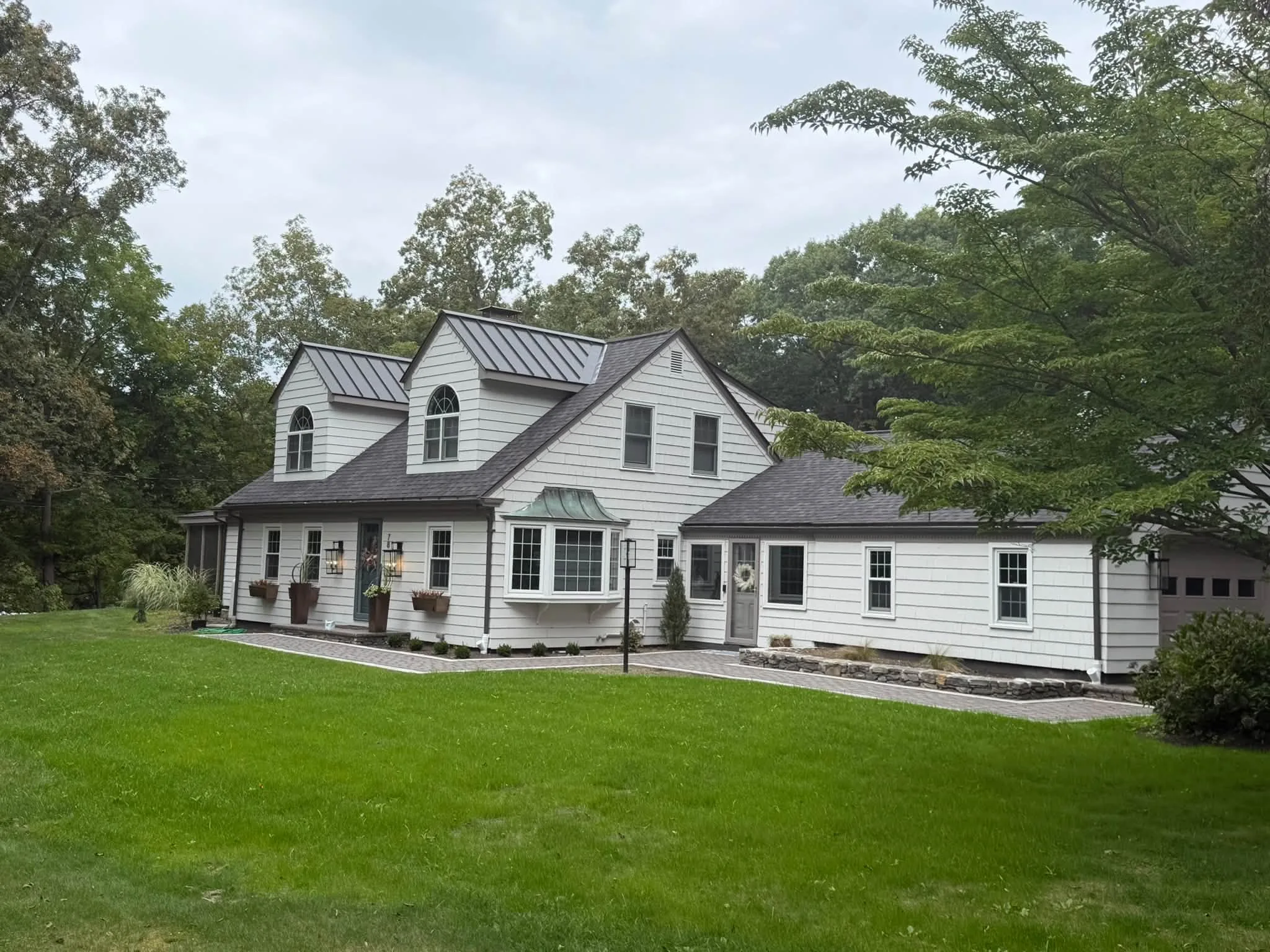 Wide view of home and completed landscaping